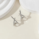 Cross Huggie Earrings
