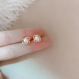 Orbit Pearl Stud Earrings